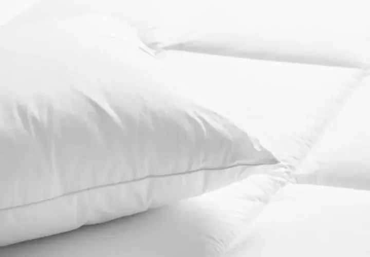 Jakie poduszki są w hotelach? Odkryj komfort snu w podróży