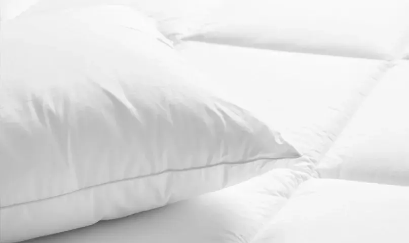 Jakie poduszki są w hotelach? Odkryj komfort snu w podróży